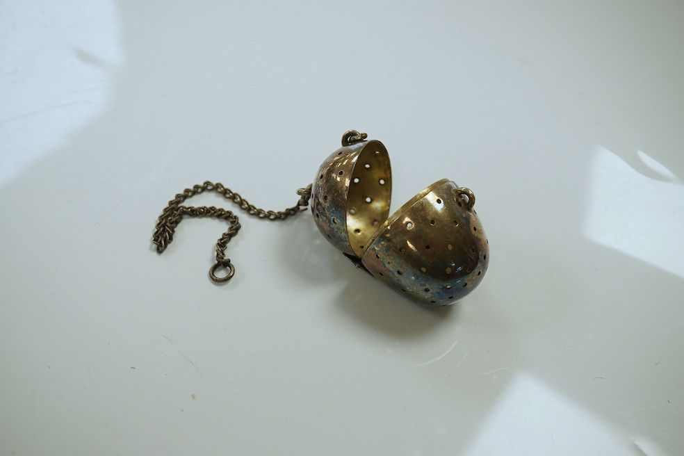 A group of mostly plated wares including a dish stand and grape shears, a white metal box and cover, a Niello decorated white metal napkin ring, a Dutch fork and spoon, and a mesh purse. Condition - fair.